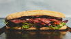 Bresaola, rucola og parmesan sandwich